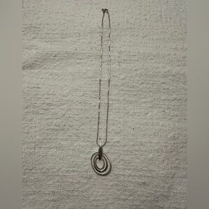 Sterling silver necklace with oval pendant